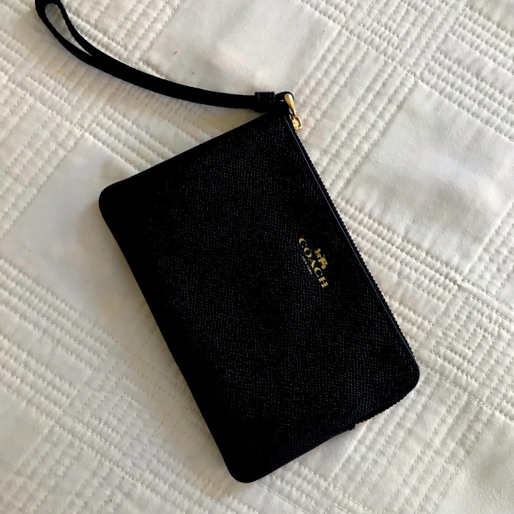 6”x4” Coach wristlet.  Like new.